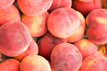 peaches on the counter market as a background
