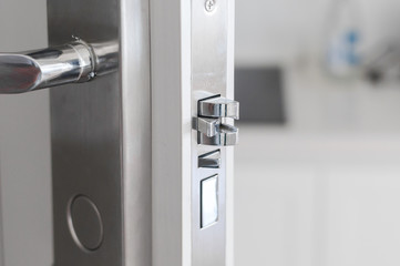 Naklejka premium Handle steel knob on the door