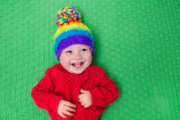 Little baby in warm knitted hat