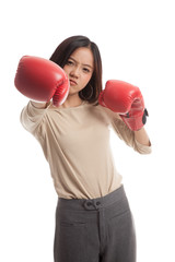 Young Asian business woman with red boxing gloves  isolated on white background