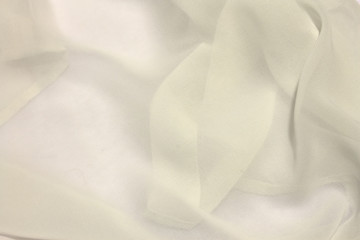 This is a photograph of White sheer fabric - obrazy, fototapety, plakaty