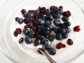 Curd with blueberries and cranberries