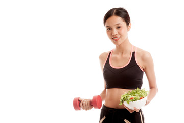 Beautiful Asian healthy girl with dumbbell and salad  isolated on white background