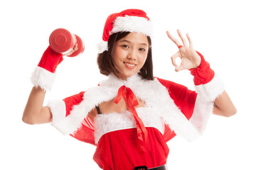 Asian Christmas Santa Claus girl show Ok with red dumbbell  isolated on white background