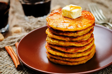 Banana Pumpkin Pancake with butter and maple syrup