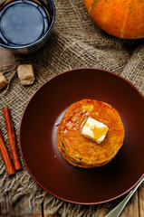 Banana Pumpkin Pancake with butter and maple syrup