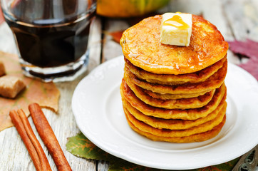 Banana Pumpkin Pancake with butter and maple syrup