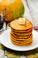 Banana Pumpkin Pancake with butter and maple syrup