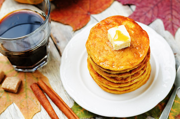 Banana Pumpkin Pancake with butter and maple syrup