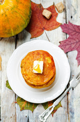 Banana Pumpkin Pancake with butter and maple syrup