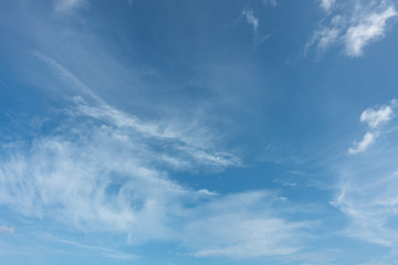 Naklejka na ściany i meble blue sky background with white clouds