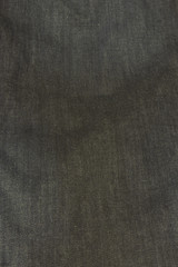 This is a photograph of dark wash denim jeans background