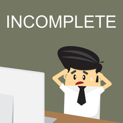 Frustrated desperate business man sitting over work at desk