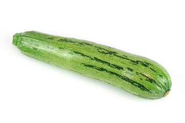 single fresh zucchini isolated on white background