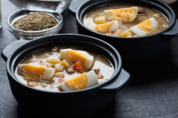 The sour soup made of rye flour with eggs