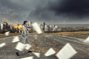 Businessman throwing petrol bomb .  Mixed media