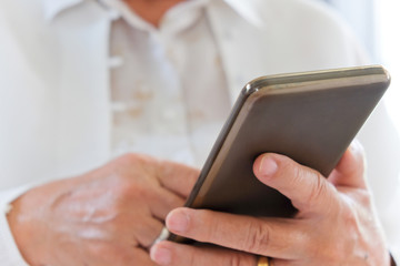Senior woman using smart phone