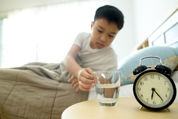 Glass of water in the bedroom