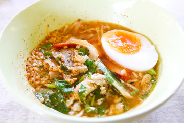Thai style spicy noodle with egg.