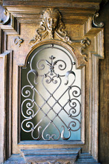 Old iron door with key-stone