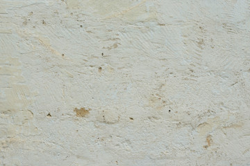 Wall fragment with scratches and cracks
