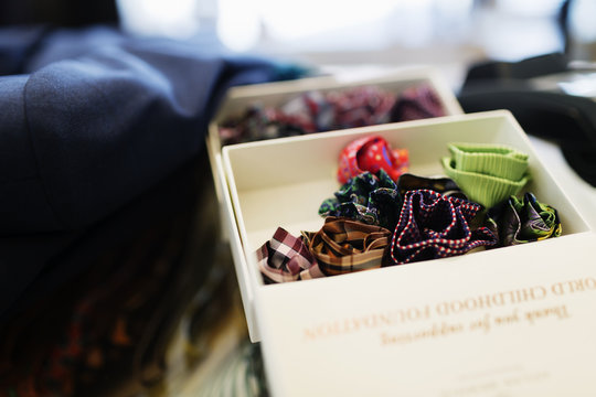 Close-up of boutonnieres in box at clothing store