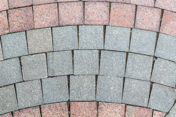 Obraz premium Detail of pavement, lined with ceramic granite square tiles