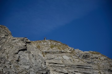 Two men on mountain top