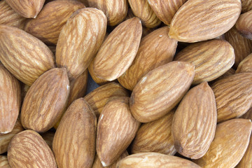 Fototapeta premium This is a photograph of a pile of Almonds