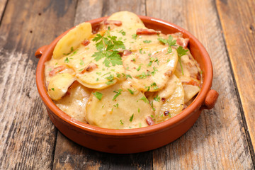 truffade,french dish with potato,bacon and cheese