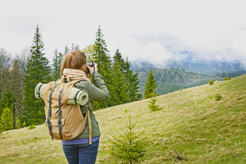 Female tourist in mountains