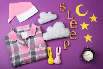 Fototapeta na wymiar Sleep concept with accessories on color background