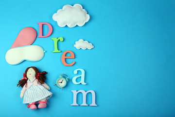 Sleep concept with accessories on color background