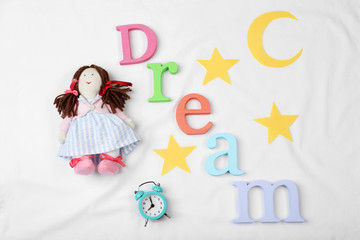 Sleep concept with accessories on color background