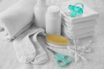 Obraz na płótnie Canvas Baby accessories for hygiene on towel