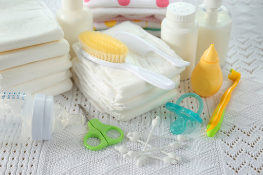 Baby accessories for hygiene on tablecloth