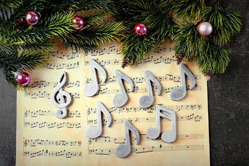 Christmas decorations on music sheets