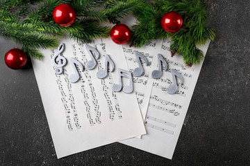 Christmas decorations on music sheets