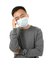 Ill man wearing mask isolated on white