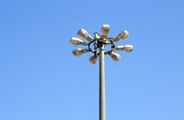 Modern street lamp over blue sky