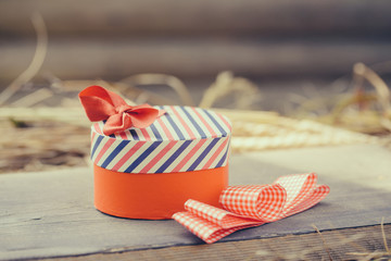 red heart box on wooden board