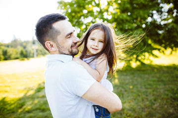 Fototapeta premium father and daughter resting together in nature , outdoors