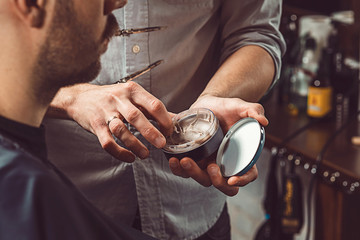 Hipster client visiting barber shop