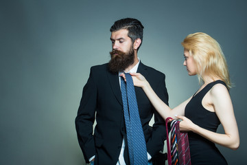 young couple with tie