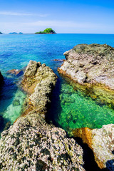Beautiful islands in Thailand. snorkeling paradise with clear sea water and stones beach