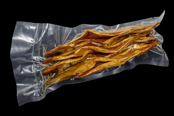 vacuum packed cold smoked Baikal omul on the black background  - 116391986