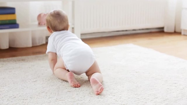 happy little baby crawling in living room at home 22