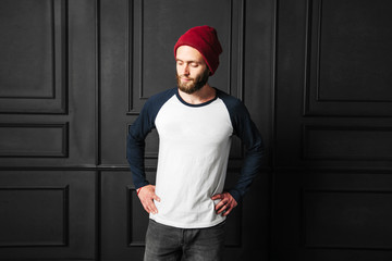 white blank t-shirt with space for your logo on a hipster man wi