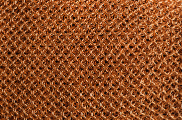 Shiny and polished copper chainmail background