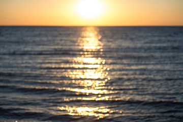 Blurry sunrise above the sea. May be blurry sunset. Excellent bokeh.